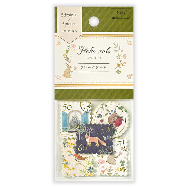 Packaged flake seals with decorative designs on a white background