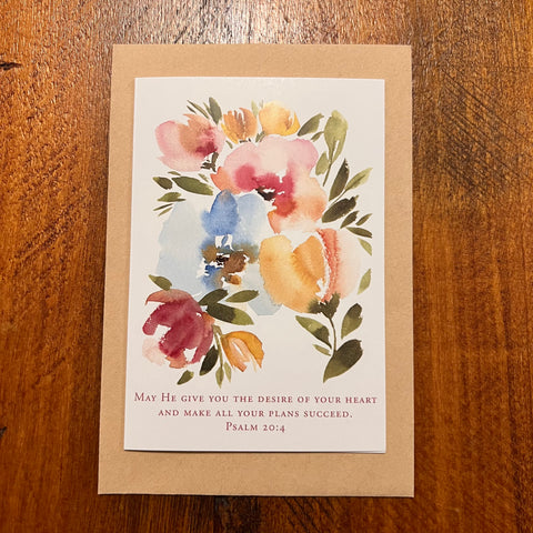 Floral card with a quote on a wooden surface bible verse card