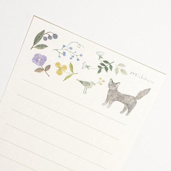 Notebook with fox illustration and floral design on a white background