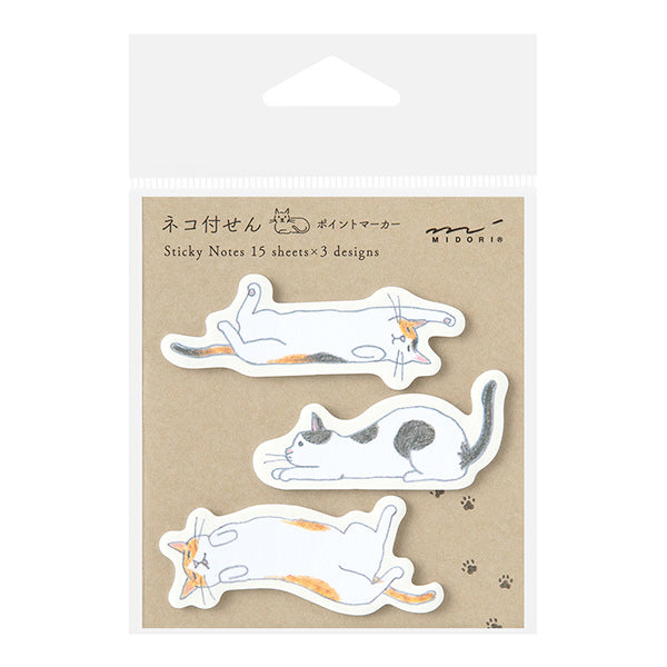 Pack of cat-themed sticky notes with illustrations on a beige background